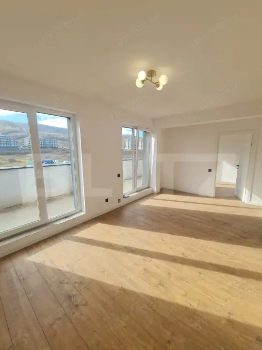 Apartament finisat, 52 mp utili, terasa 34 mp, zona Terra