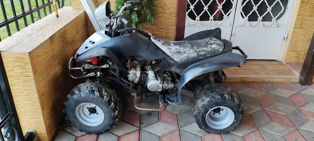 Vând atv 125 transmisie pe cardan necesita un capac ambreiaj preț 1300 euro 