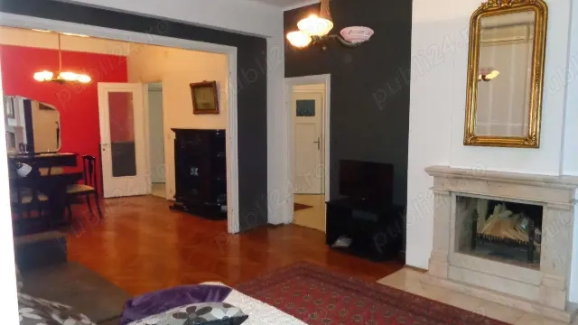 Apartament cu 4 camere, cu o suprafață utilă de 105 m2, situat între Piața Română și Calea Victoriei