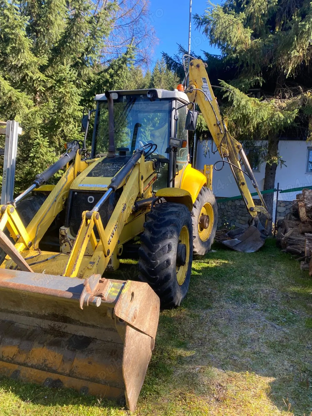 Vand sau schimb buldoexcavator New Holland 