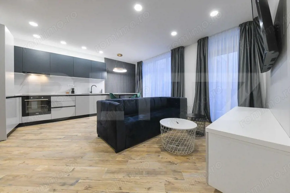 Apartament de 2 camere 58 mp,  modern, parcare, zona Umf