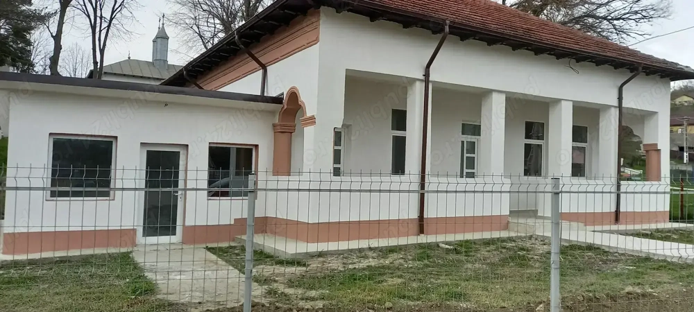 Clădire cu destinație afaceri sau casa de locuit