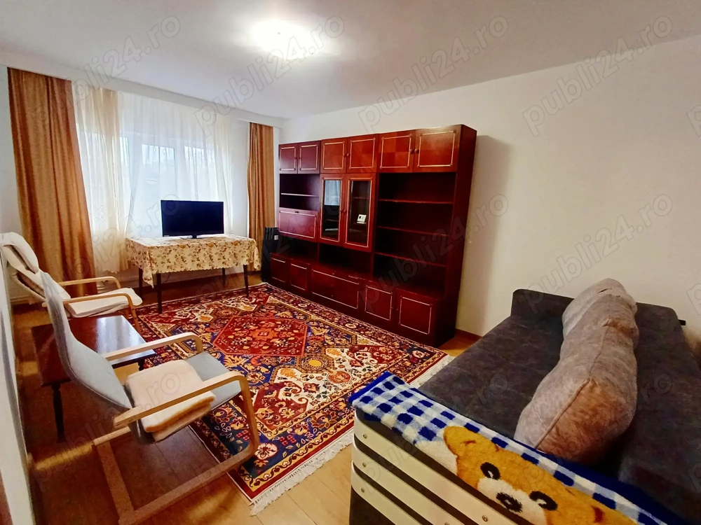 Inchiriez apartament cu 2 camere mobilat in micro 17 etajul 1.