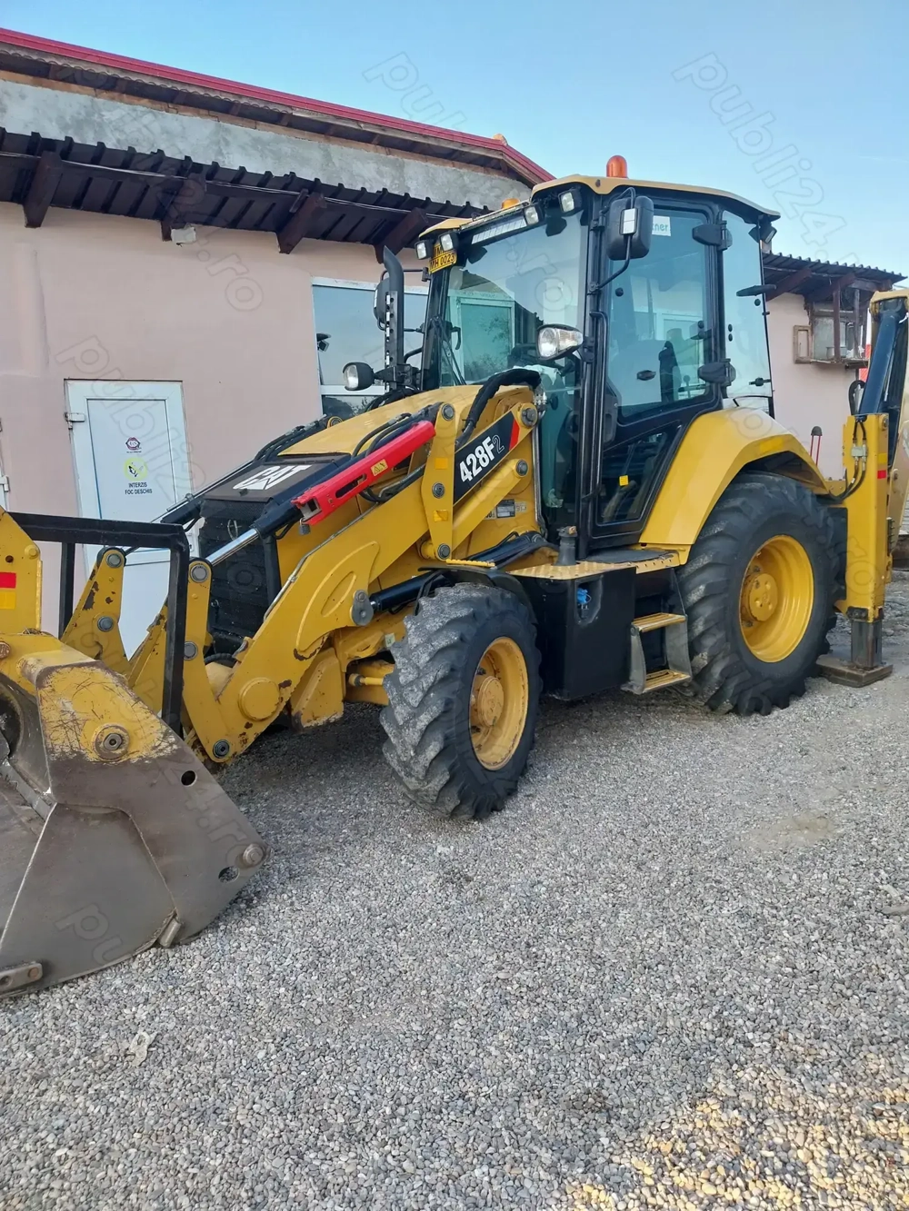 Buldoexcavator Caterpillar 428f2 