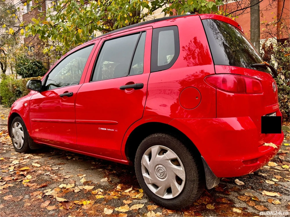 vand mazda 2 an 2003 