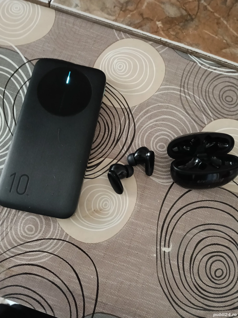 vand casti si baterie externa 