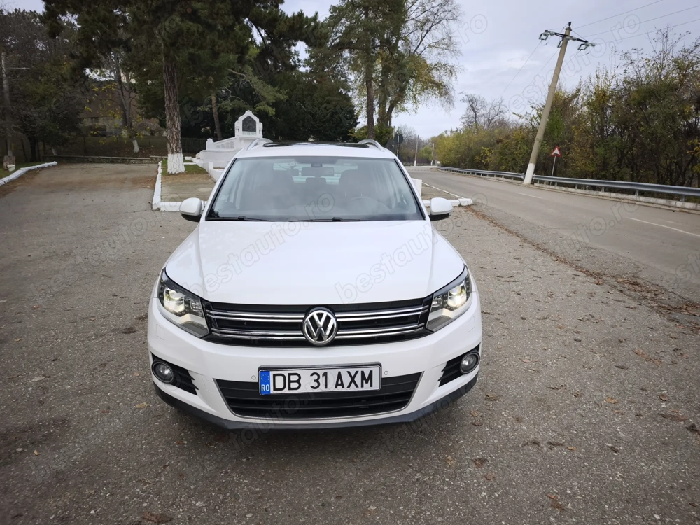 volkswagen tiguan,an 2013