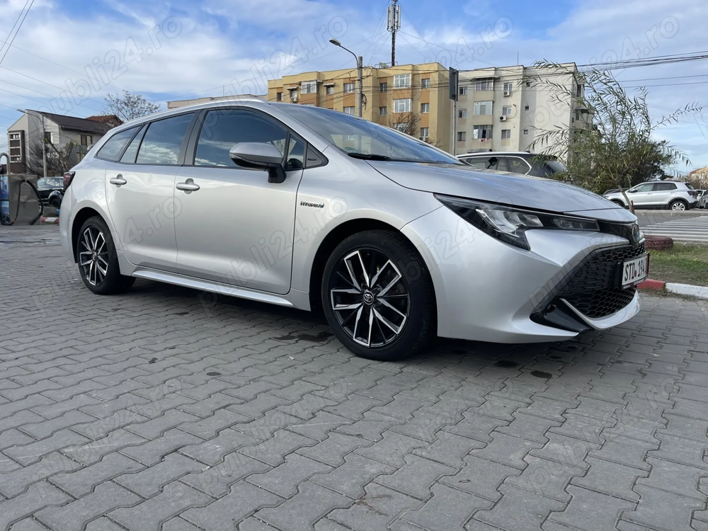Vând Toyota Corolla break hybrid 2,0,stare excelentă, istoric la zi,77000 km 