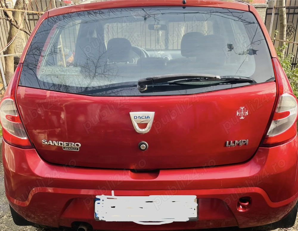 Vând Dacia Sandero 1,4 benzină .