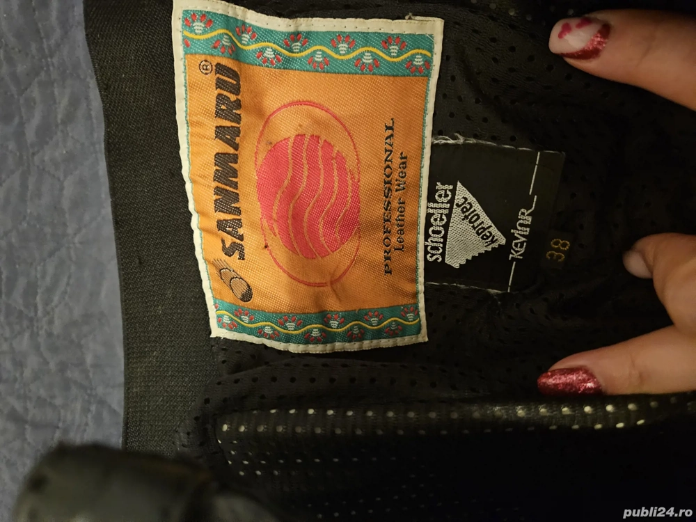 pantaloni motociclist din piele