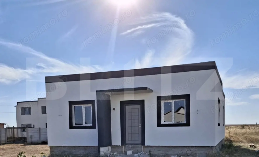 Casa pe parter în Cârcea, 103 mp utili, zona Metro, teren 350 mp