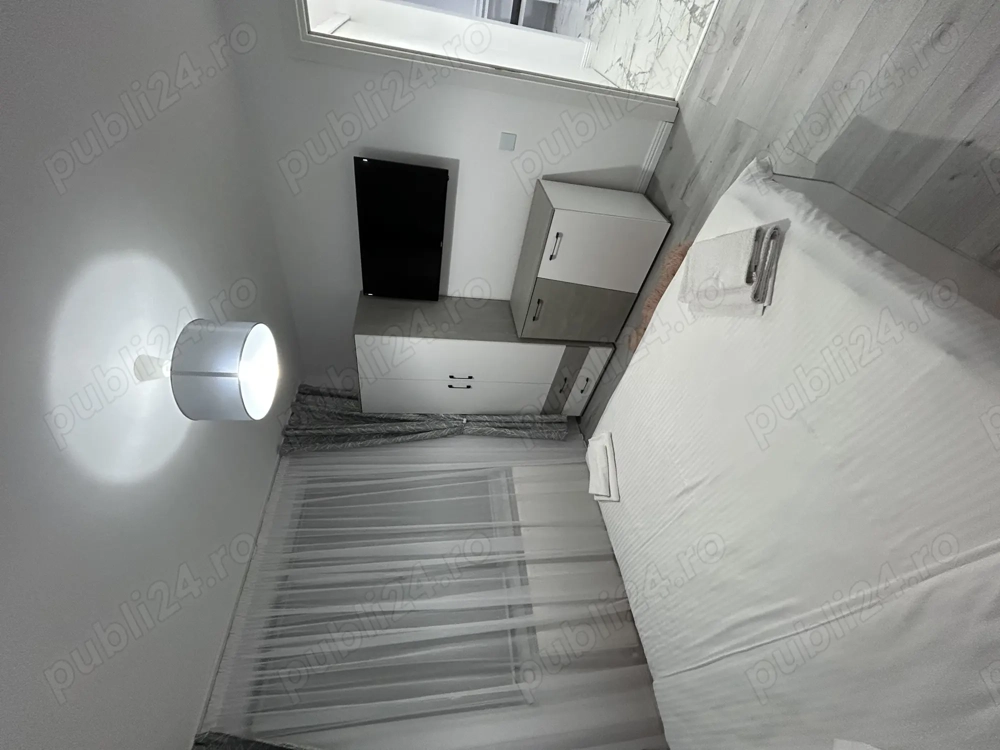 Închiriez apartament central parter cu 3 camere