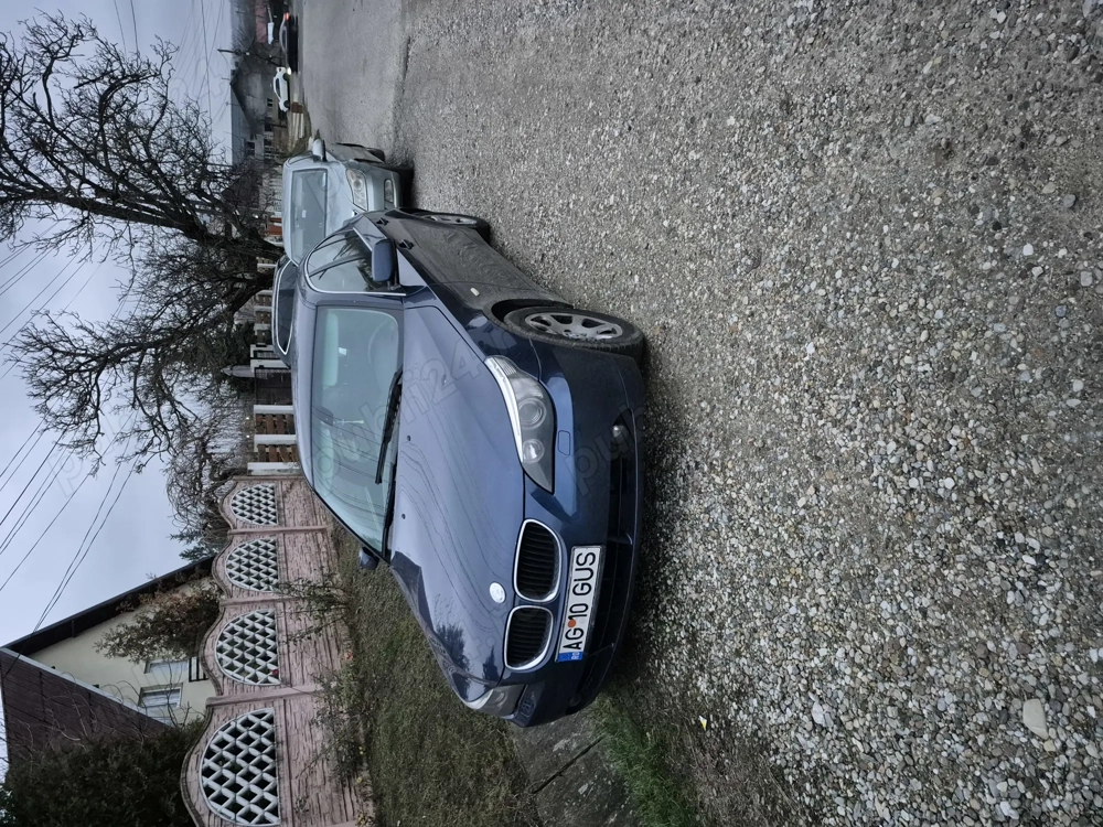 Vind bmw e 60 benzina 2005