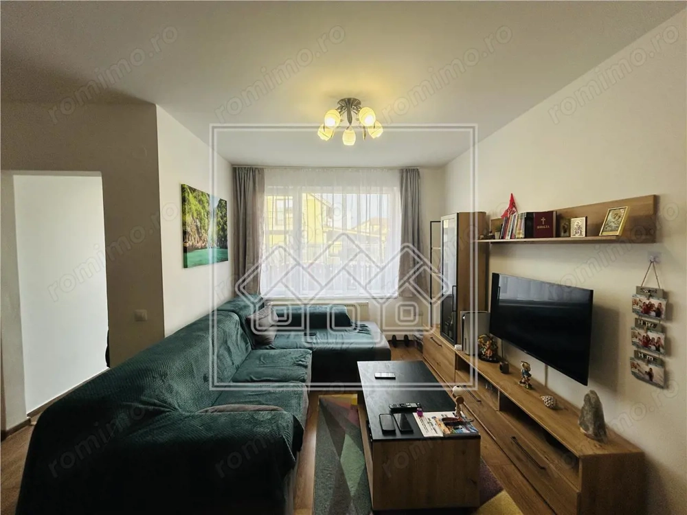 Casa cu 82 mp utili, gradina de 30 mp, Calea Cisnadiei