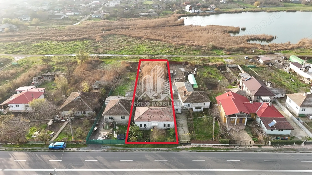 Teren intravilan 1052mp cu casa renovabila de cărămidă Tuzla