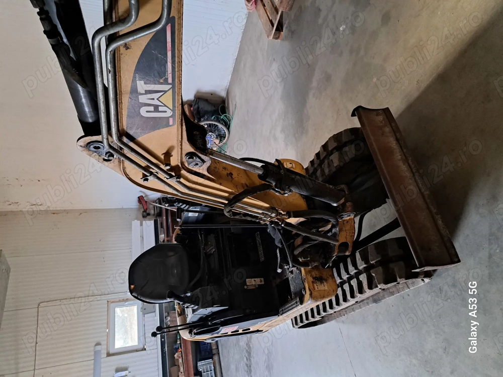 Vand excavator Caterpillar 1.6