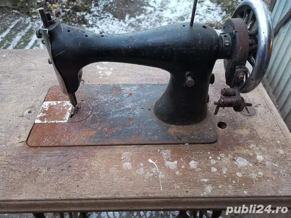 Masina de cusut Singer