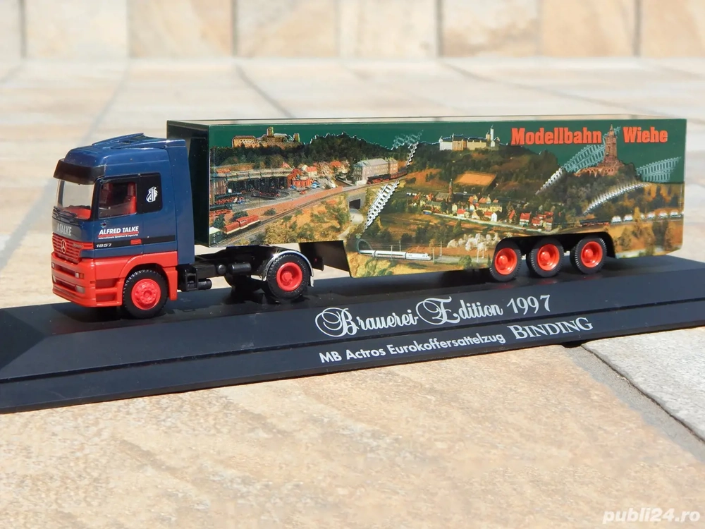 Macheta camion transport Mercedes-Benz Actros 1857 Herpa cu vitrina