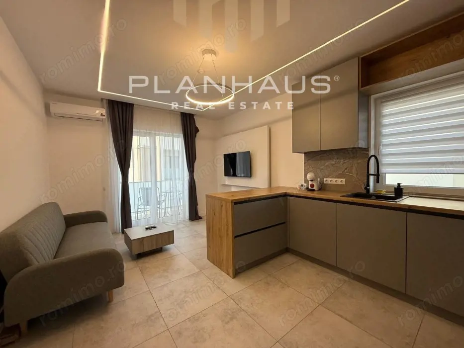 Inchiriere-ultramodern apartament zona rezidentiala ,3 camere,etaj 1,loc de parcare 