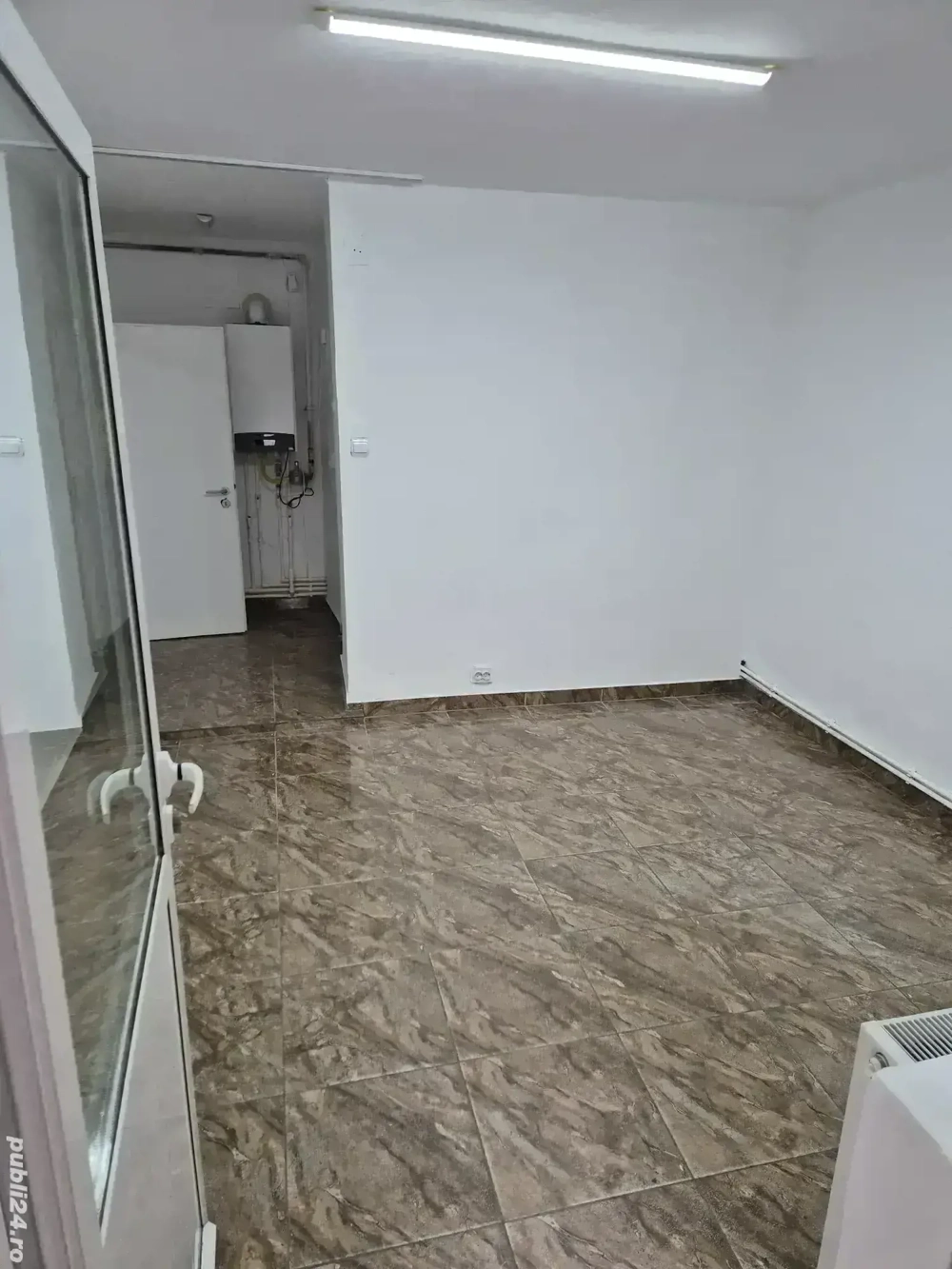 camera de închiriat  spatiu comercial