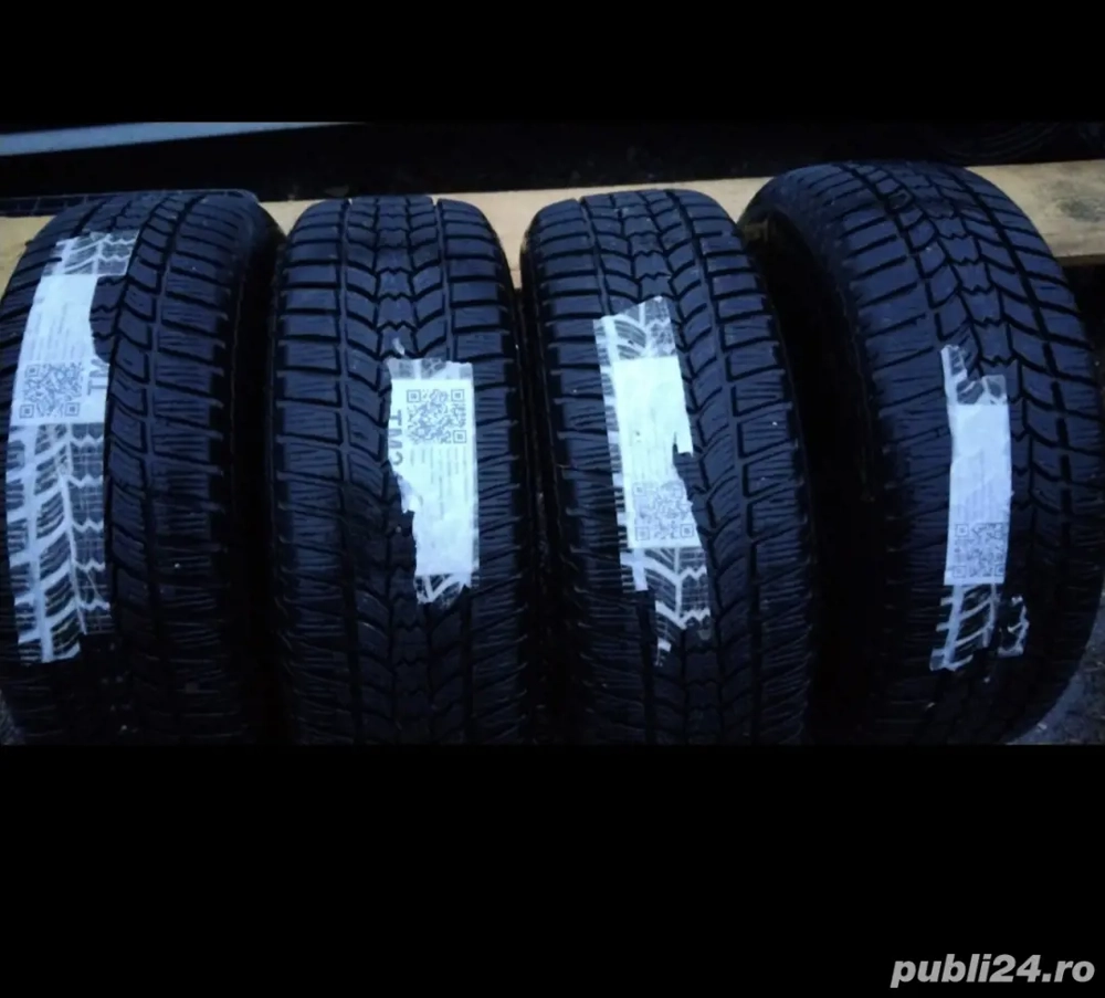 Roti iarna Opel Astra J Benzina 215 60 R16 + capace + jante + anvelope