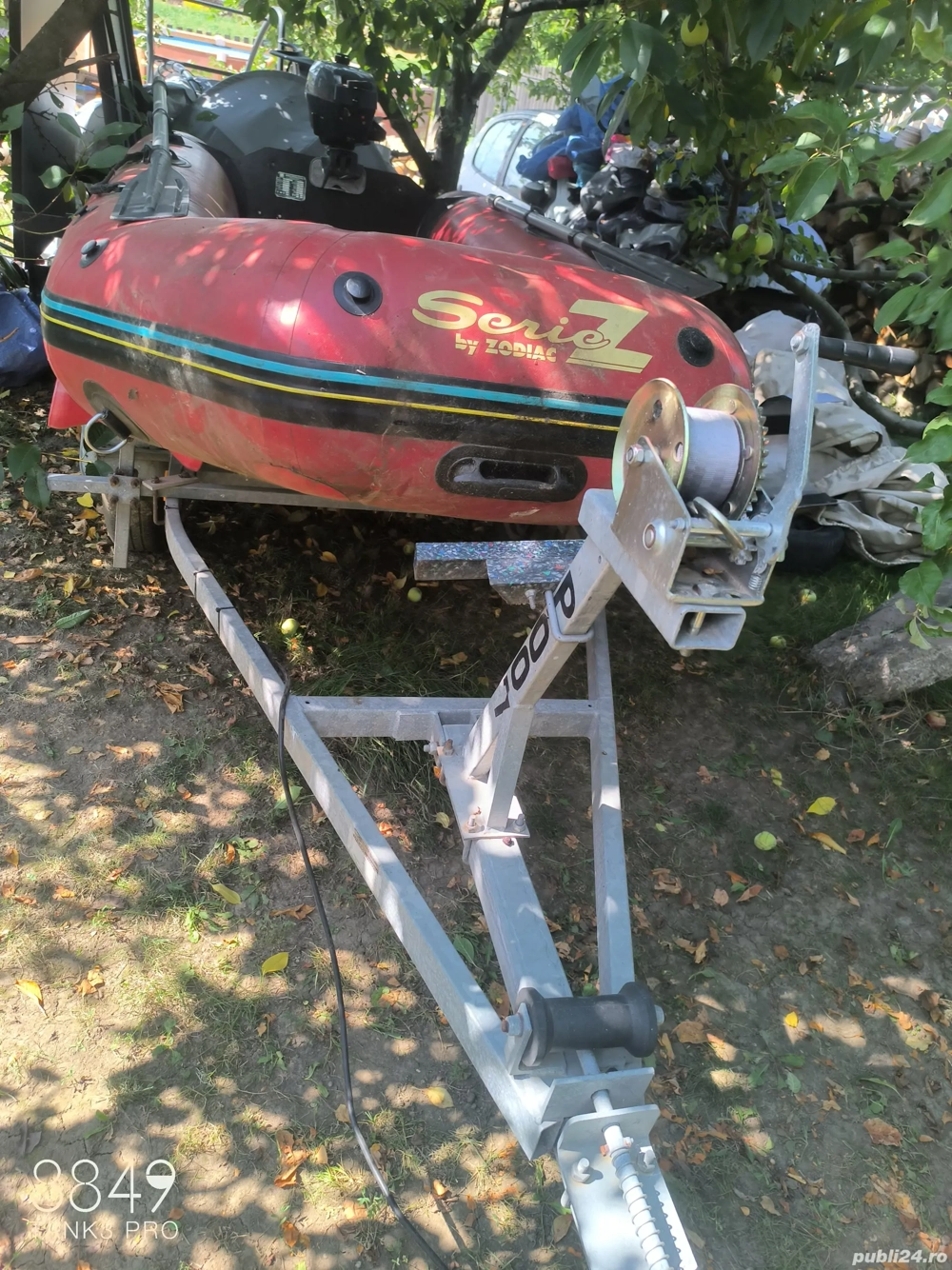 Vand barca gonflabila cu motor 4 cai si peridoc