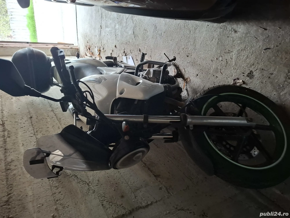Vind motocicleta Honda,stare perfectă de funcționare, întreținere bună, înmatriculată 