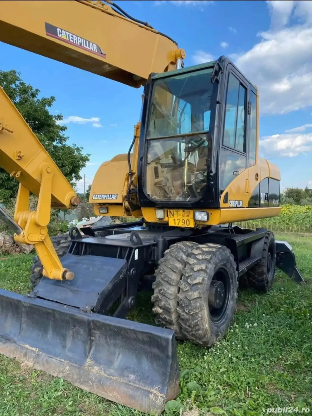 Vând excavator Cat M315C