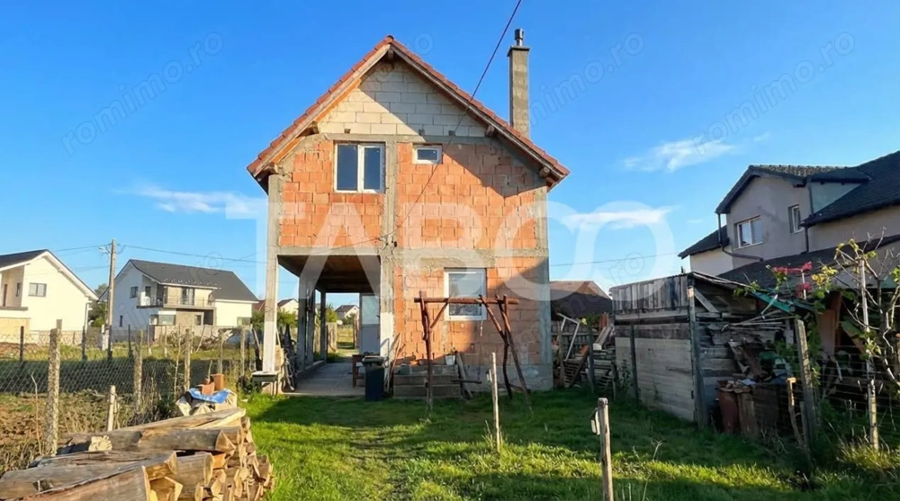 Casa individuala 4 camere cu curte de 550 mp 2 bai Cristian Sibiu 