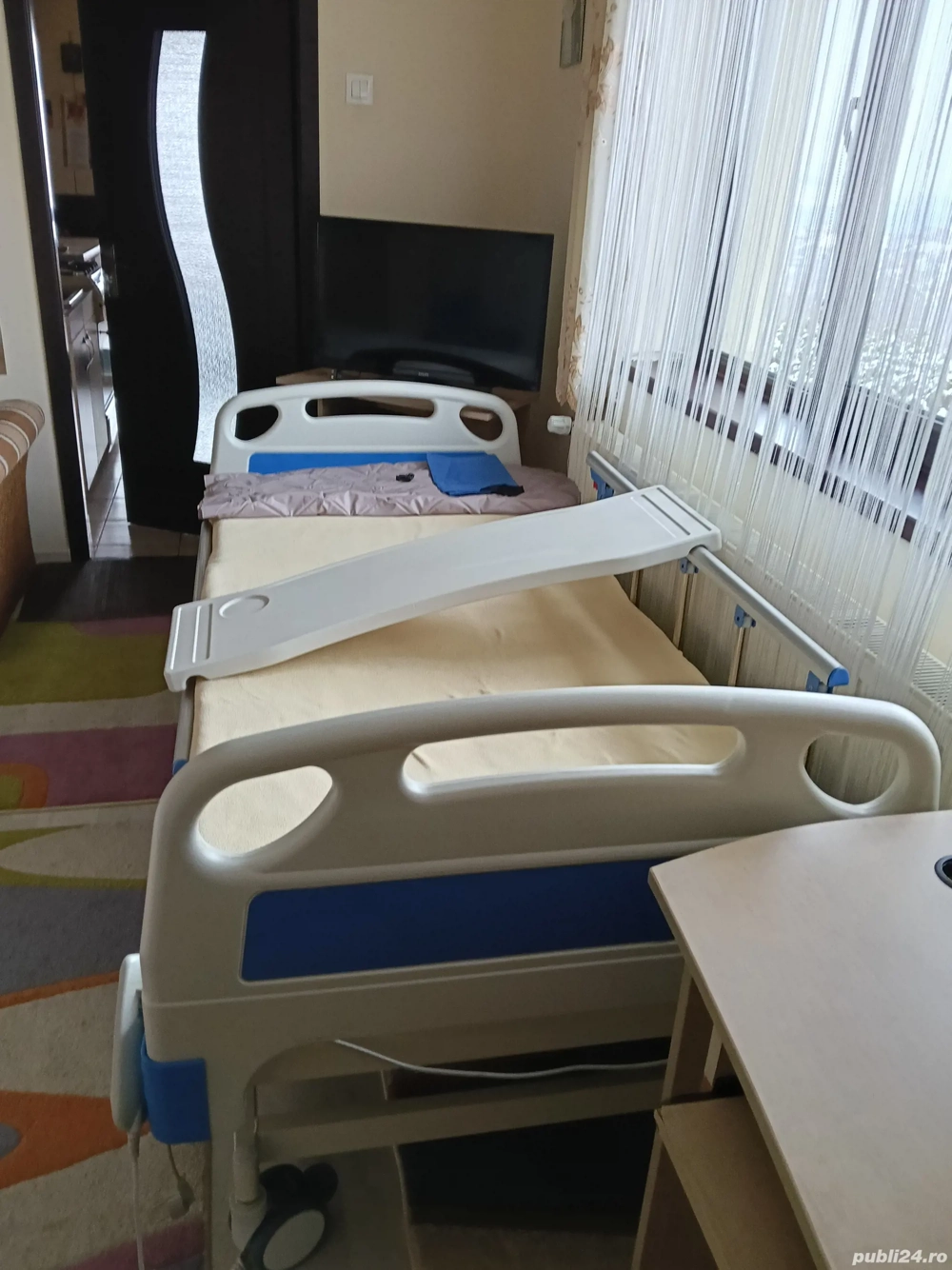 Pat electric cu telecomanda pentru persoane cu dizabilități