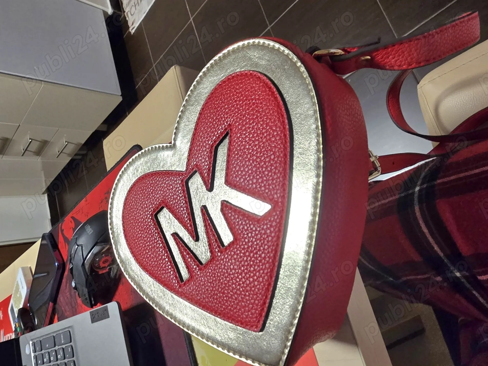 Geanta inimioara Michael Kors 