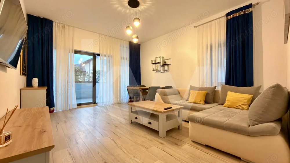 Apartament la parter cu curte privată, terase și două locuri de parcare