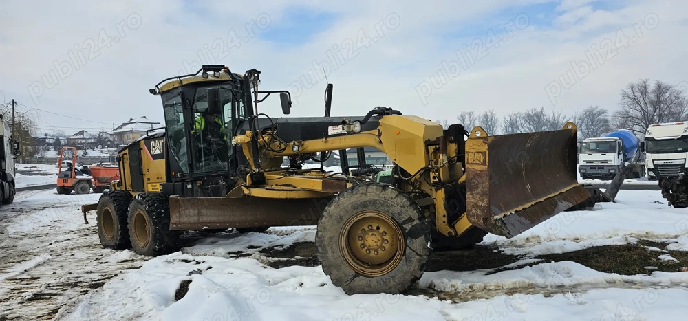 Greder Caterpillar CAT 120M 6x6 cu scarificator