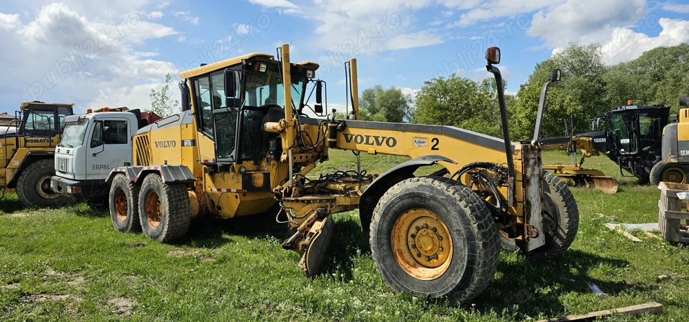 Greder Volvo G976 6x6 scarificator și lamă