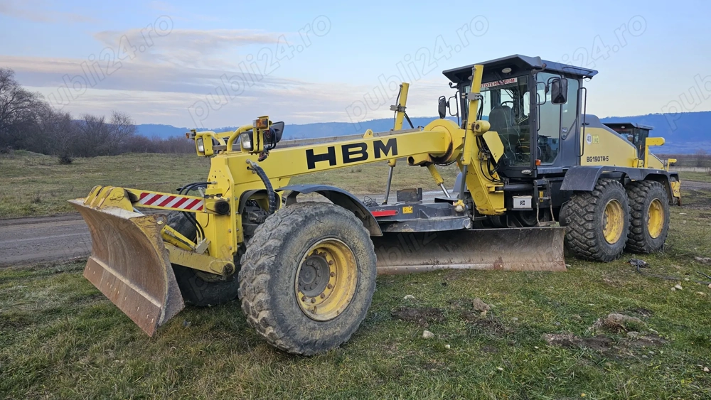 Greder HBM BG 190 TA-5 6X6 cu scarificator si lamă