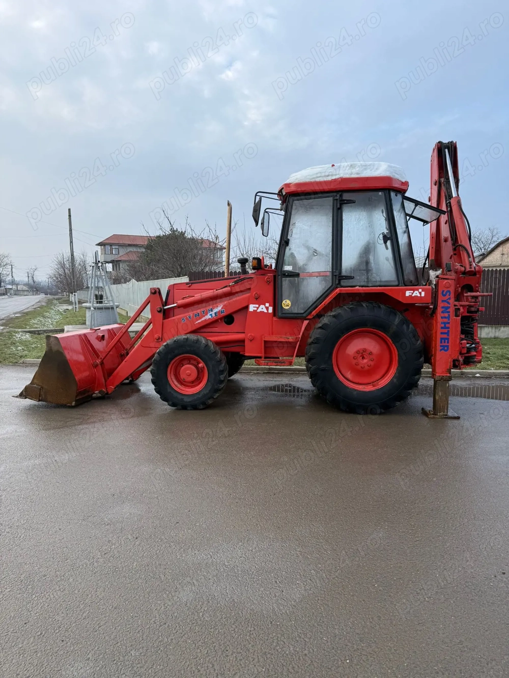 Buldoexcavator Fai Komatsu