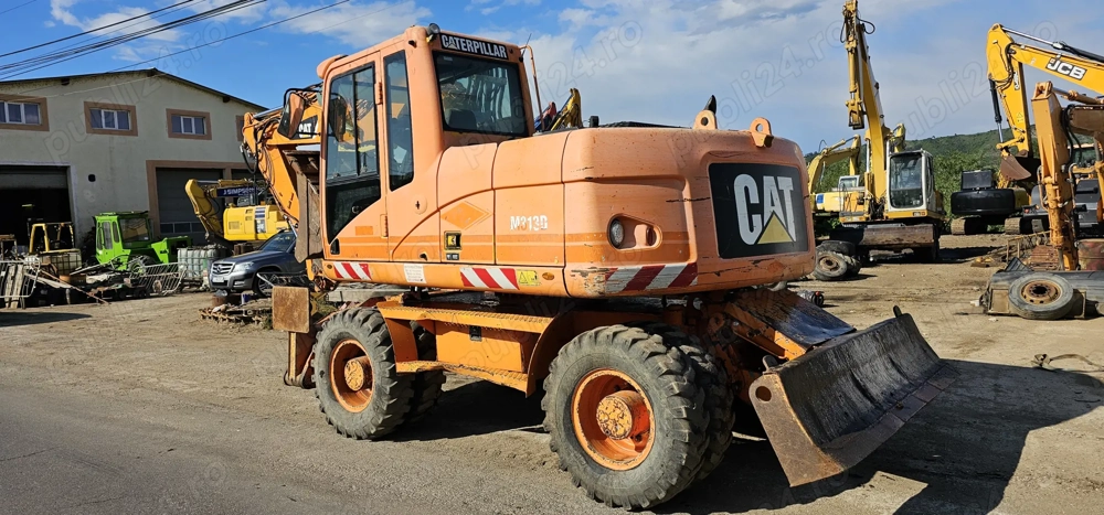 Excavator pe roti Caterpillar CAT M313 D