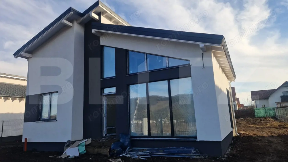 Casa Harman individuala , 712 mp teren , moderna, intabulata toate utilitatiile