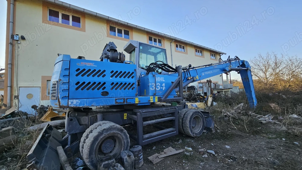 Excavator pe roti Fuchs MHL 334 pentru fier vechi