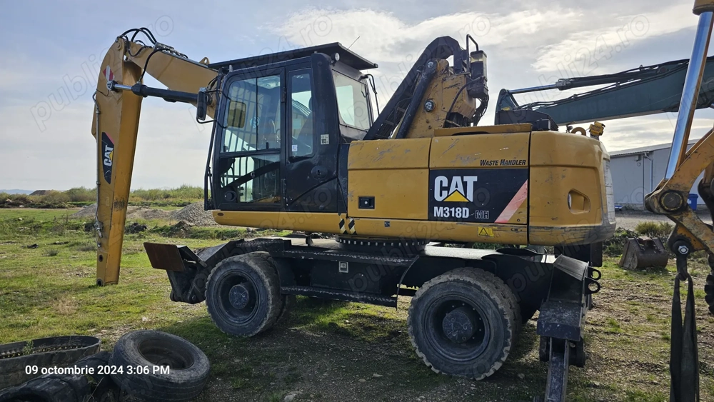Excavator pe roți Caterpillar CAT M318 