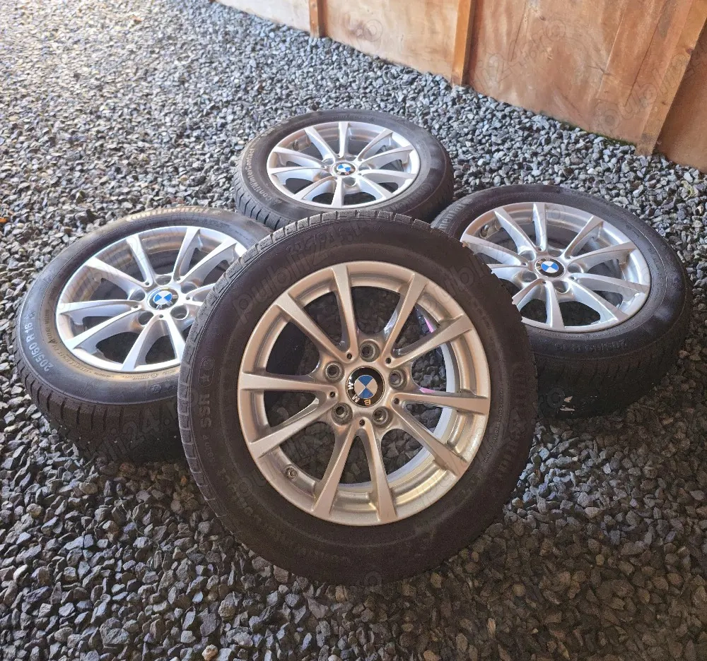Set jante BMW originale 16 cu anvelope Continental M + S  205/60 R16