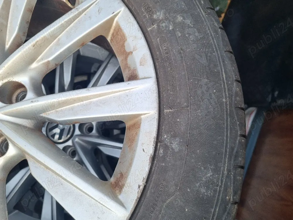4 cauciucuri 235 55 17 cu jante de aliaj 5x112 de volswagen 