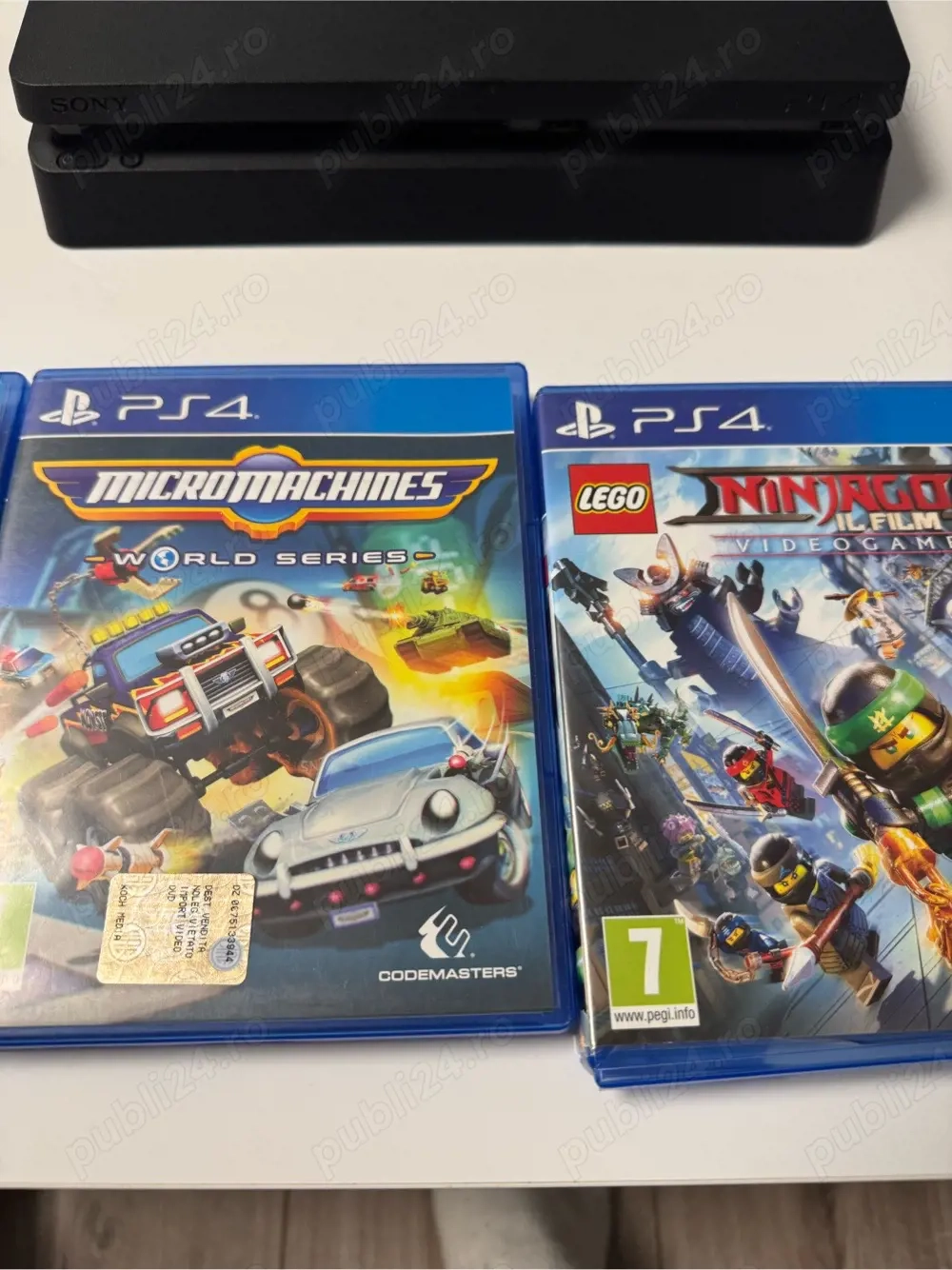 Vând Play station 4 cu doua console si 5 Jocuri