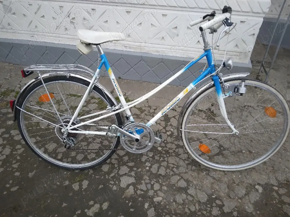 vând bicicletă ,semicursiera Atomic de lei 