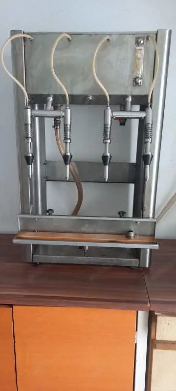 Mașină de umplut manuală cu 4 capuri,inox.