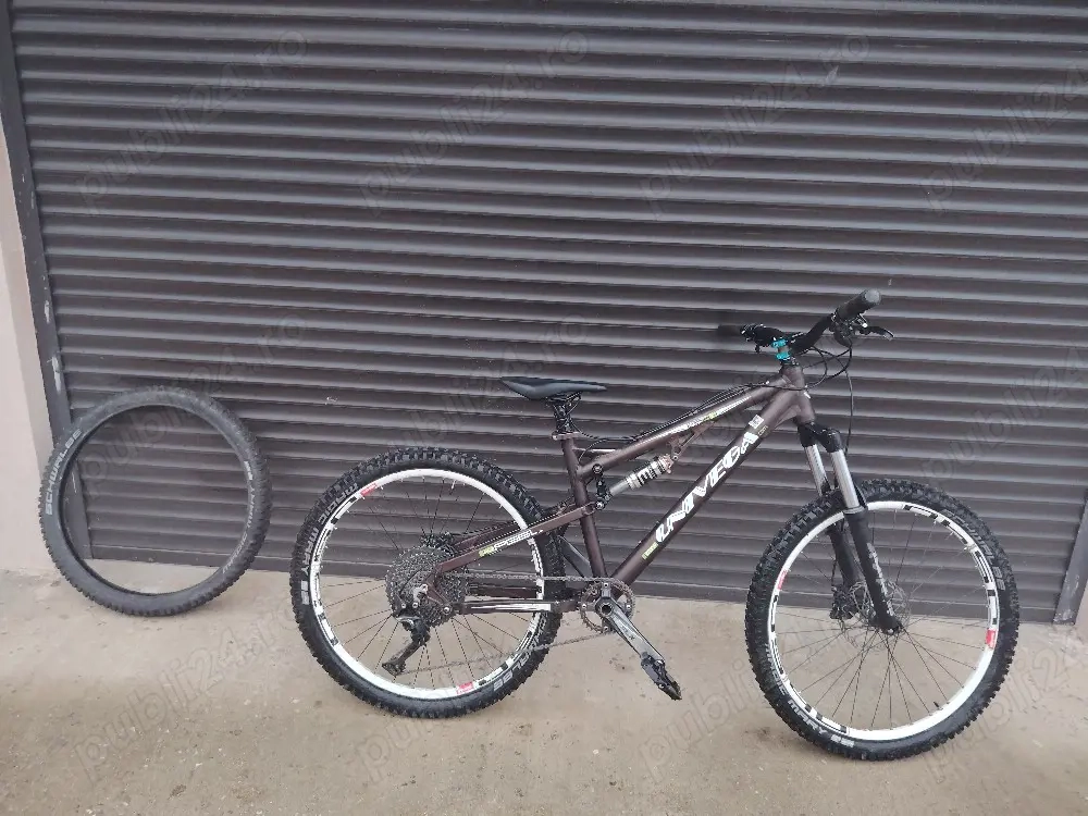 Vând bicicleta univega ram am 1 cadru M