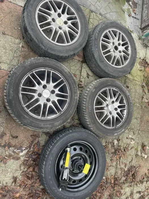 Vand set 4 jante de aluminiu ford/citroen plus rezerva