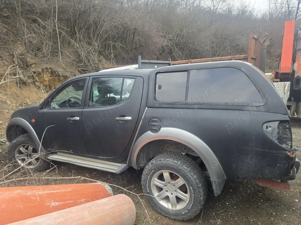 vand mitsubishi l200 fara cutie