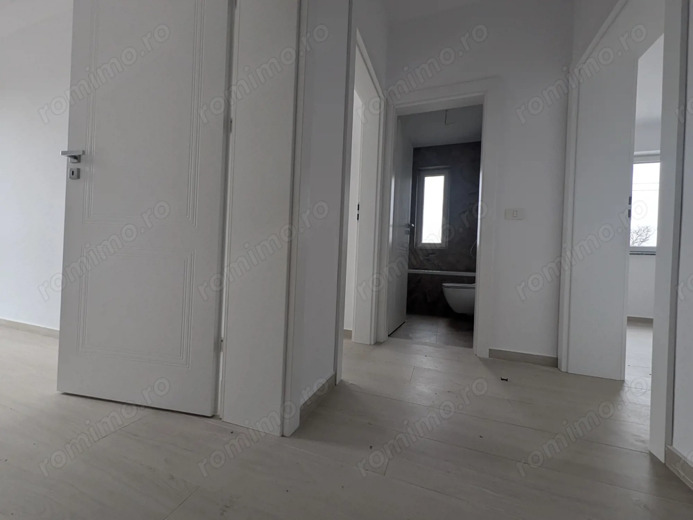 Ap.2 cam- 54 mp - Giroc-Zona Eso - Bloc nou- Decomandat- Bucatarie inchisa- Etaj 2 - Parcare inclusa