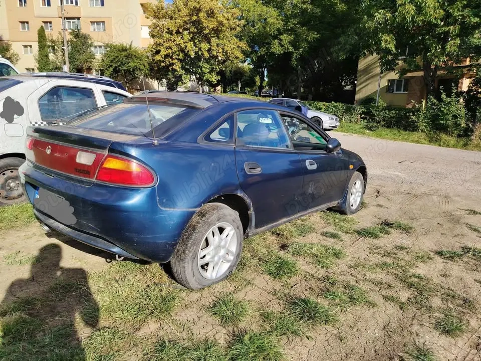 Dezmembrez Mazda 323 benzină